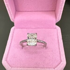 Elegant Solitaire Radiant-Cut Engagement Ring in sterling silver